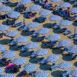 aerial photography of blue-and-white patio umbrellas